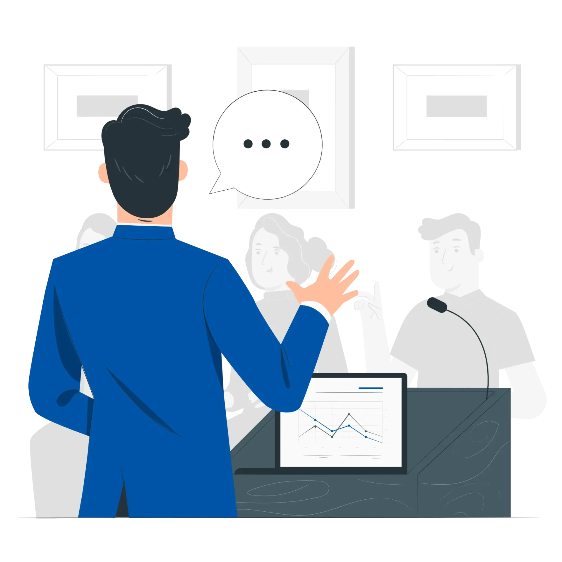 A person in a blue suit gestures as they speak to a small audience, with a graph displayed on a table in front of them.